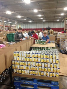 Local 1000 members preparing and packing boxes of food for tornado victims