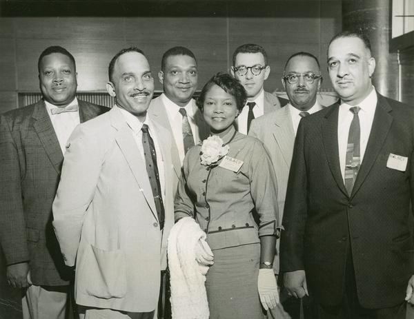 UPWA (United Packinghouse Workers of America) delegates at 1957 convention with Herbert Hill. From left to right are Ollie Webb, Richard Miller, Charles Hayes, Addie Wyatt, Herbert Hill, Phil Weightman, and Russell Lasley.