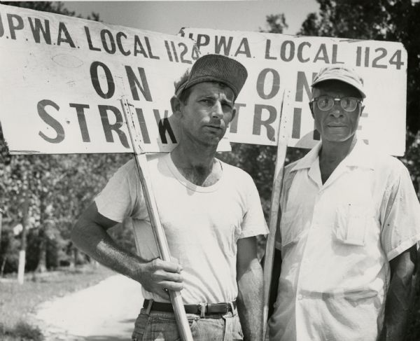 Two members of United Packinghouse Workers Local 1124 in New Orleans on strike against the Colonial Sugar Company. 