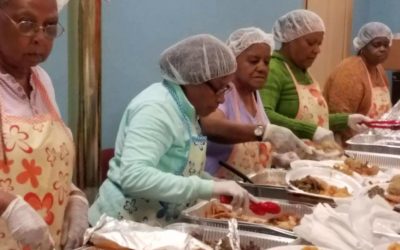 UFCW Local 342 member serve food to hungry community members
