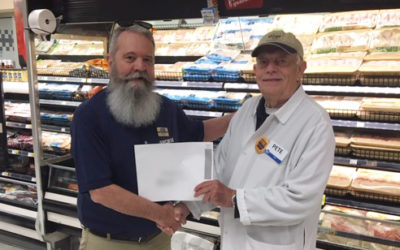 UFCW Local 400 member Clarence Pete stands with UFCW rep