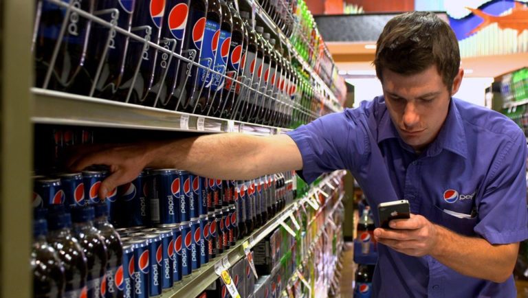 Pepsi vendor stocks shelves