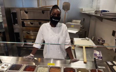 Apraisja Gee at work behind the deli counter