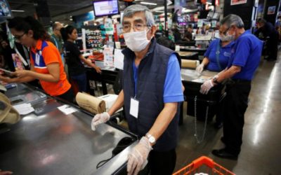 Coronavirus Masked Grocery Cashier