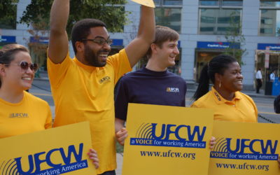 UFCW members with UFCW signs