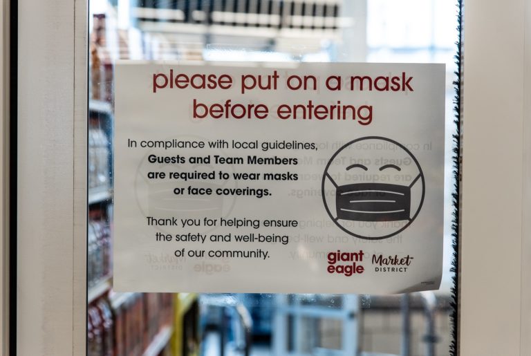 Dave's Midtown Giant Eagle Mask Sign