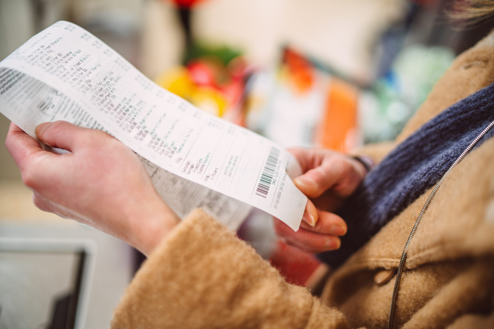 Hands holding receipt